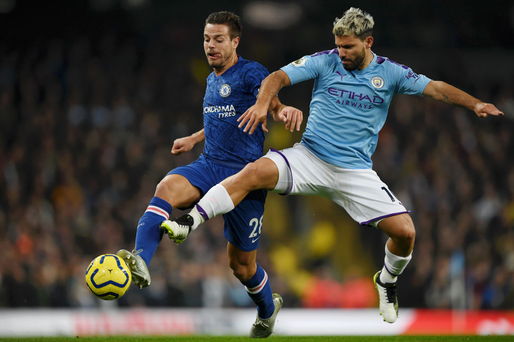 Cesar Azpilicueta of Chelsea battles with Sergio Aguero of Manchester City