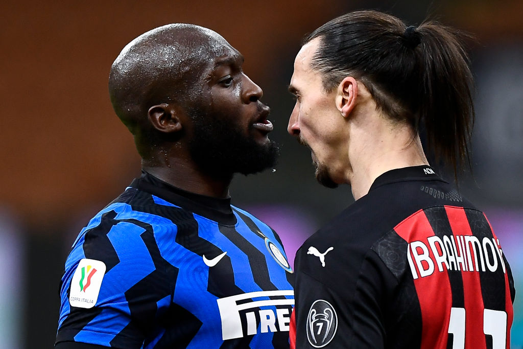 Zlatan Ibrahimovic (R) of AC Milan argues with Romelu Lukaku