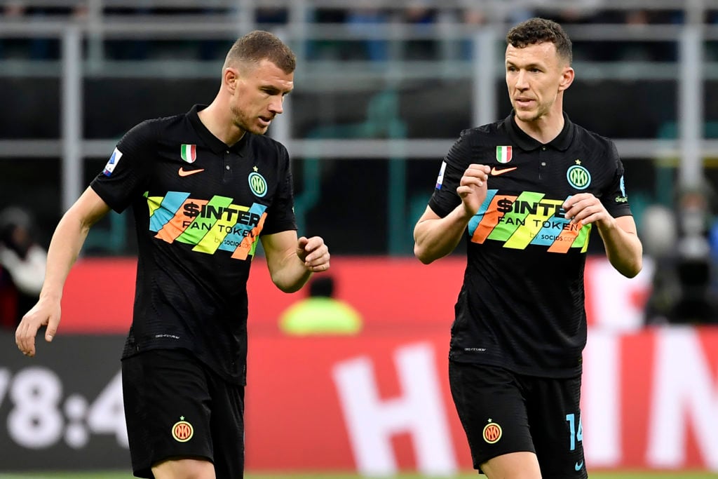 Edin Dzeko and Ivan Perisic of FC Internazionale talk during