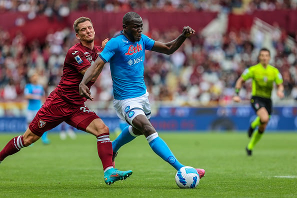 Kalidou Koulibaly of SSC Napoli competes for the ball with...