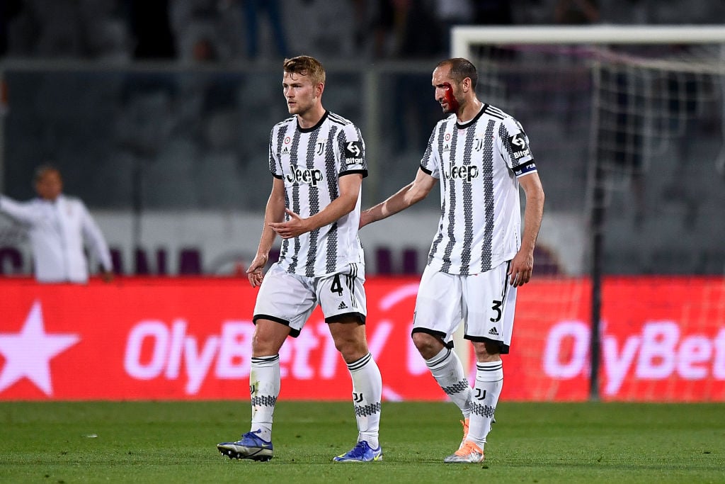 Giorgio Chiellini (R) of Juventus FC bleeds during the Serie