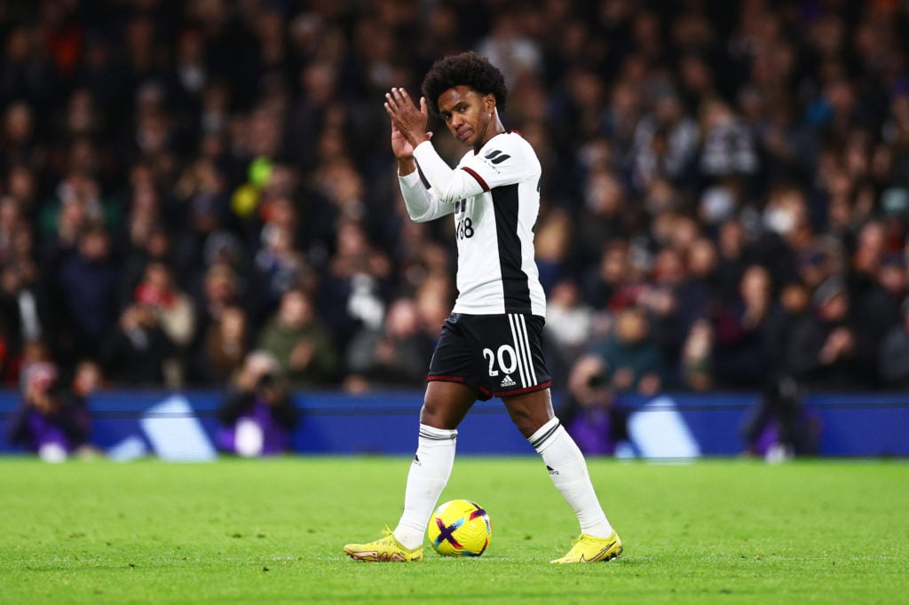 Willian of Fulham applauds the fans as he is substituted off during the Premier League match between Fulham FC and Chelsea FC