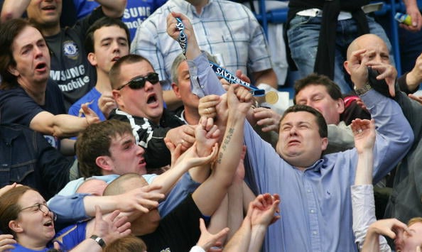 Chelsea supporters scramble to grab Mana