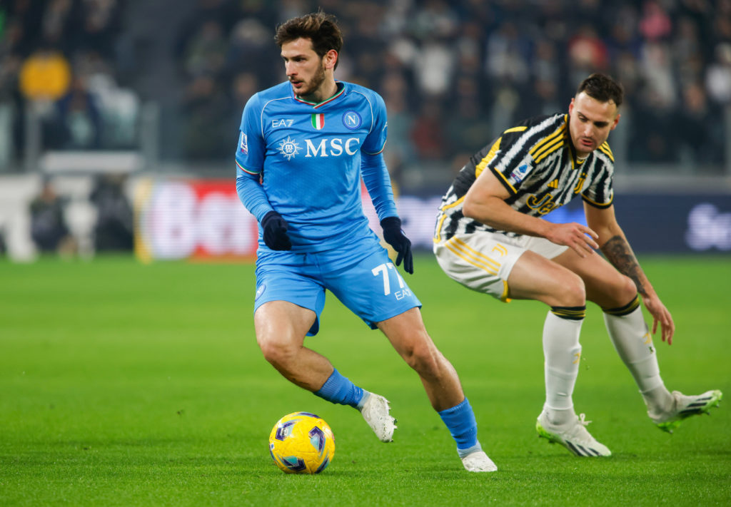Khvicha Kvaratskhelia of Napoli (L) and Federico Gatti of