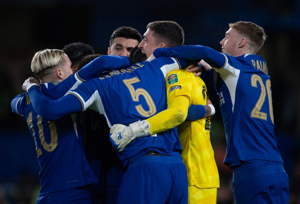 Chelsea players celebrating with goalkeeper Djordje Petrovic after penalty shoot-out win