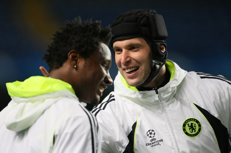 Chelsea goalkeeper Petr Cech dishes out punishment to Mikel John Obi during training