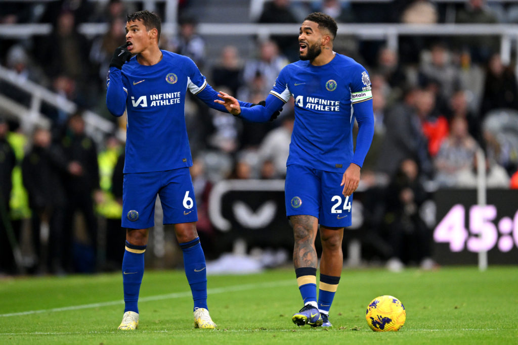 Reece James of Chelsea interacts with teammate Thiago Silva during the Premier League match between Newcastle United and Chelsea FC at St. James Pa...