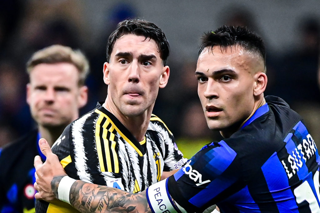 Lautaro Martinez (R) of Inter in action against Dusan Vlahovic (L) of Juventus during the Italian Serie A football match between Inter and Juventus...