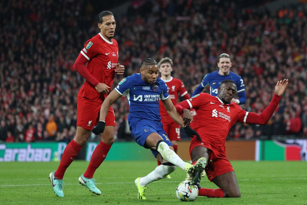 Chelsea's French striker #18 Christopher Nkunku (2L) vies with Liverpool's French defender #05 Ibrahima Konate (R) during the English League Cup fi...