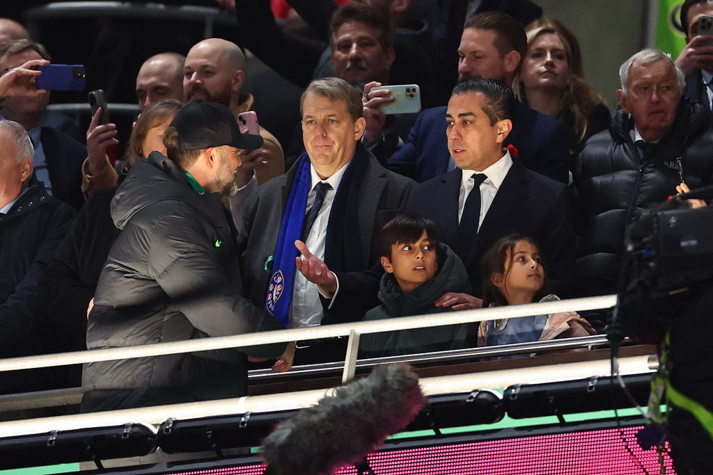 Todd Boehly, owner of Chelsea doesnt shake hands with Jurgen Klopp the head coach / manager of Liverpool during the Carabao Cup Final match between...
