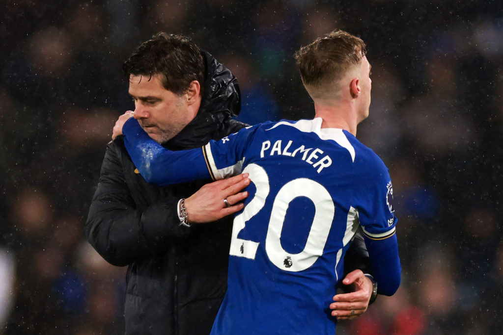 Chelsea Head Coach Mauricio Pochettino with Cole Palmer during the Premier League match between Chelsea FC and Manchester United at Stamford Bridge...