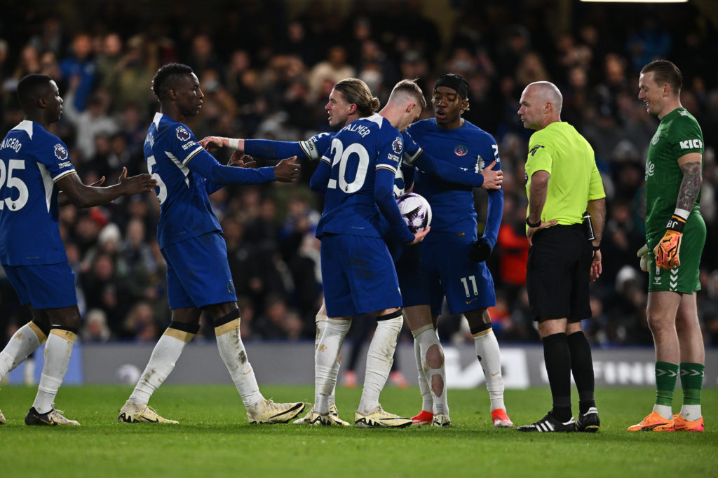 Noni Madueke and Nicolas Jackson of Chelsea argues with Conor Gallagher , Moises Caicedo and Cole Palmer of Chelsea about taking the penalty, refer...