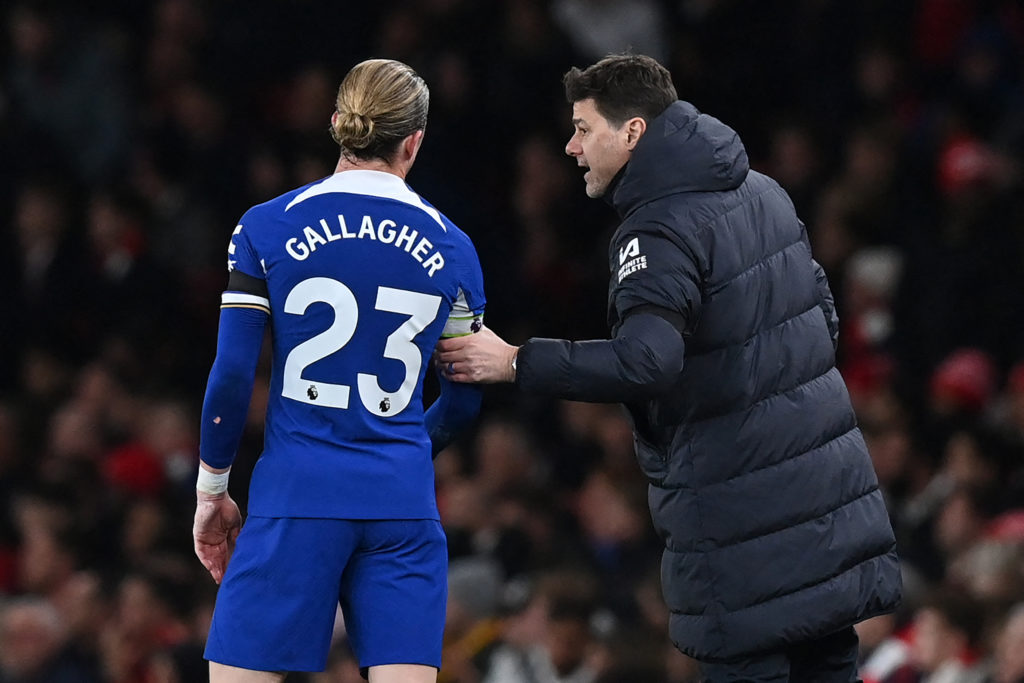 Chelsea's Argentinian head coach Mauricio Pochettino (R) speaks with Chelsea's English midfielder #23 Conor Gallagher (L) during the English Premie...