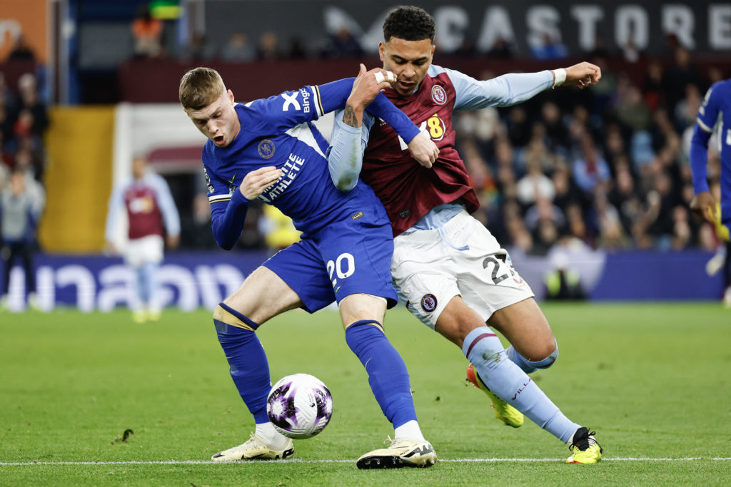 Cole Palmer of Chelsea and Morgan Rogers of Aston Ville during the Premier League match between Aston Villa and Chelsea FC at Villa Park on April 2...