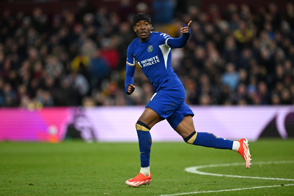 Noni Madueke of Chelsea celebrates scoring his team's first goal during the Premier League match between Aston Villa and Chelsea FC at Villa Park o...
