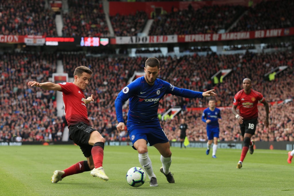 Ander Herrera of Man Utd battles with Eden Hazard of Chelsea during the Premier League match between Manchester United and Chelsea at Old Trafford ...