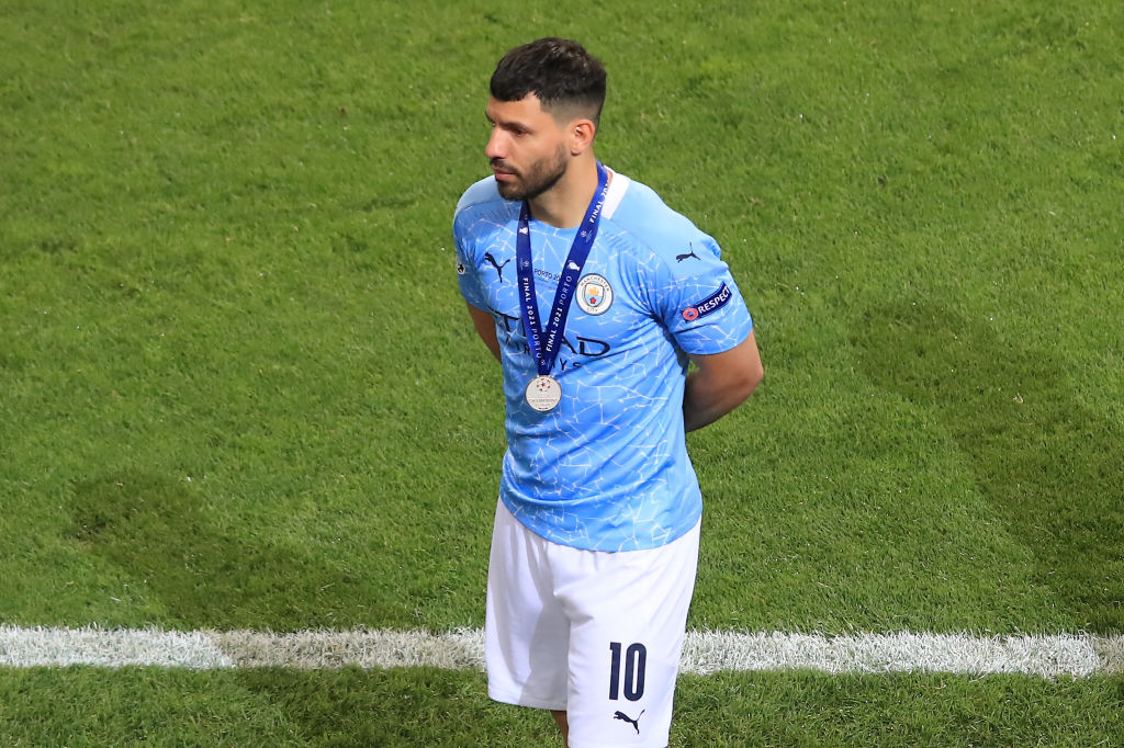 Sergio Aguero of Manchester City leaves the pitch wearing his UEFA Champions League Runners-Up Medal following his team's defeat in the UEFA Champi...