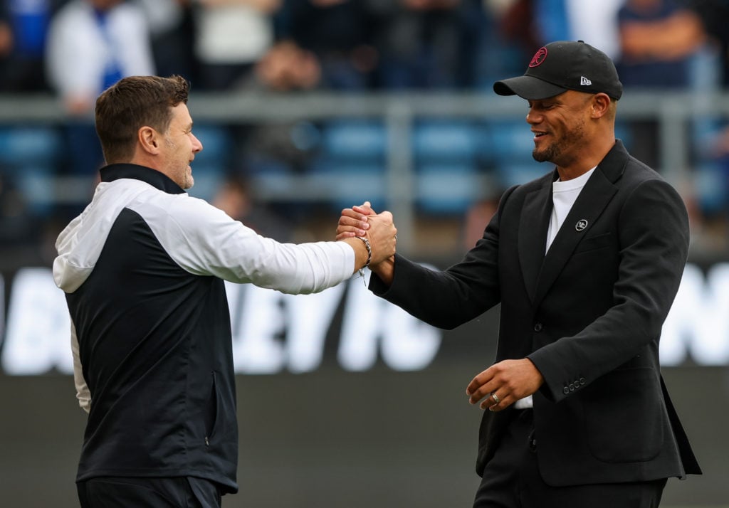 Burnley manager Vincent Kompany greets Chelsea manager Mauricio Pochettino during the Premier League match between Burnley FC and Chelsea FC at Tur...