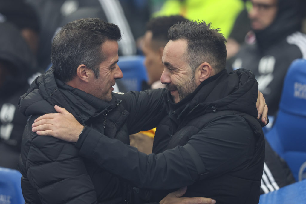 Head Coach Marco Silva of Fulham with Head Coach Roberto De Zerbi of Brighton & Hove Albion during the Premier League match between Brighton &a...