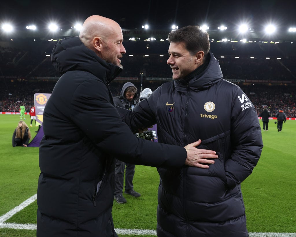 Manager Erik ten Hag of Manchester United greets Manager Mauricio Pochettino of CHelsea ahead of the Premier League match between Manchester United...