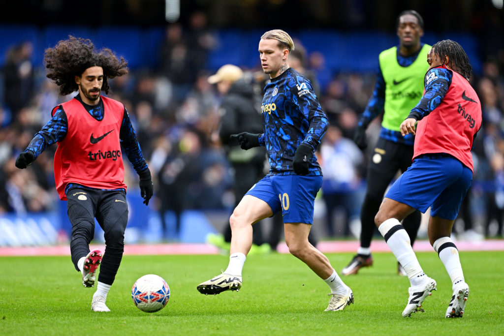 Mykhaylo Mudryk and Marc Cucurella of Chelsea warm up prior to the Emirates FA Cup Quarter Final between Chelsea FC and Leicester City FC at Stamfo...