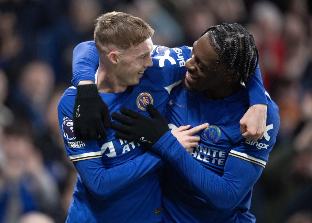 Cole Palmer of Chelsea (L) celebrates scoring his teams second goal with Axel Disasi of Chelsea (R) during the Premier League match between Chelsea...