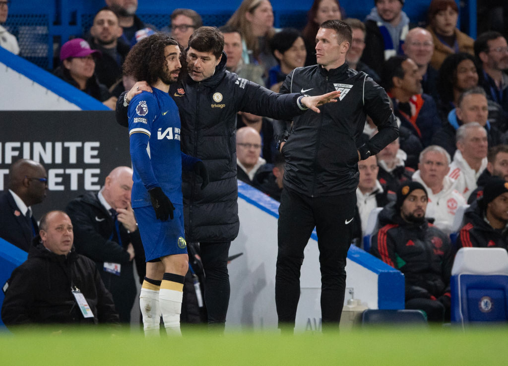 Marc Cucurella of Chelsea receives instructions from manager Mauricio Pochettino during the Premier League match between Chelsea FC and Manchester ...