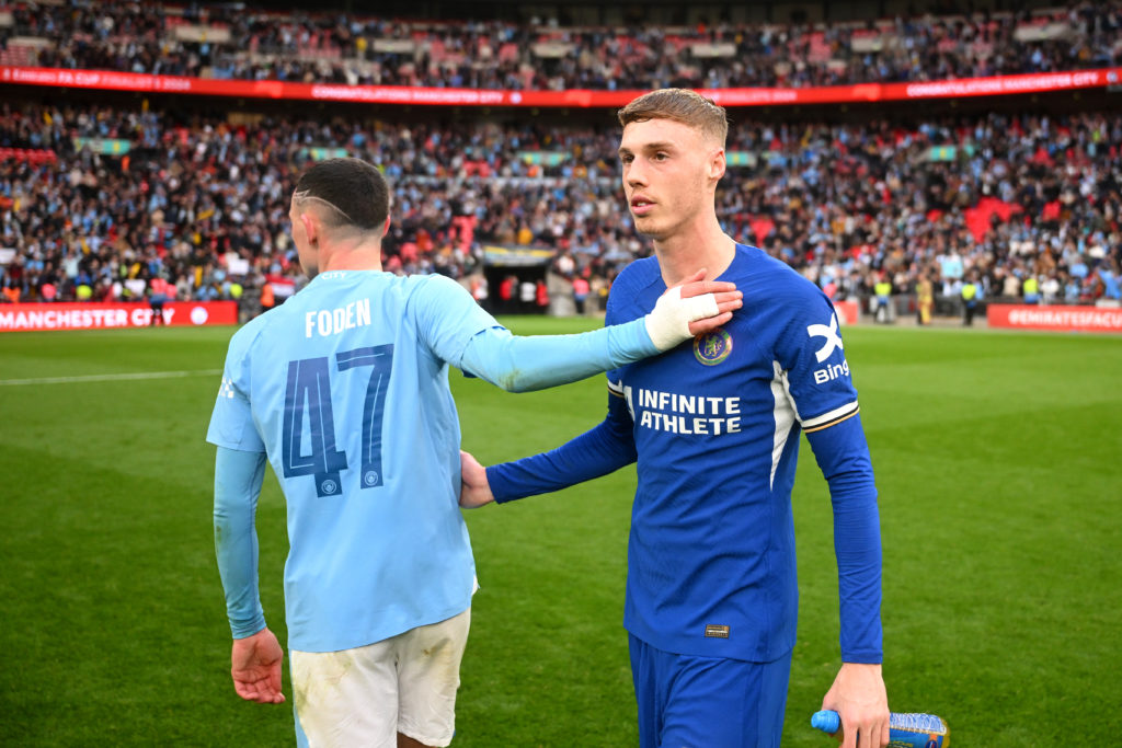 Phil Foden of Manchester City consoles Cole Palmer of Chelsea after the Emirates FA Cup Semi Final match between Manchester City and Chelsea at Wem...