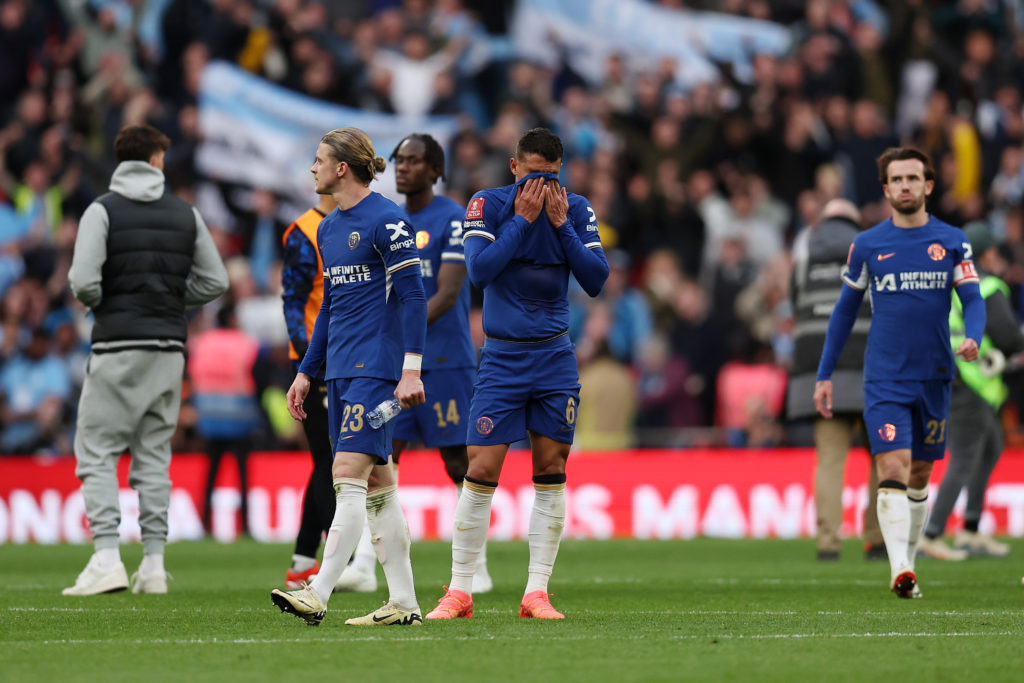 Conor Gallagher and Thiago Silva of Chelsea look dejected after the team's defeat in the Emirates FA Cup Semi Final match between Manchester City a...
