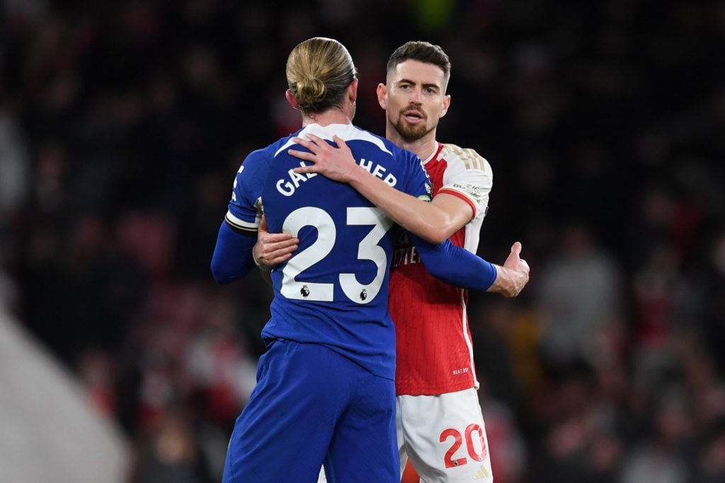 Jorginho of Arsenal embraces Conor Gallagher of Chelsea following the Premier League match between Arsenal FC and Chelsea FC at Emirates Stadium on...