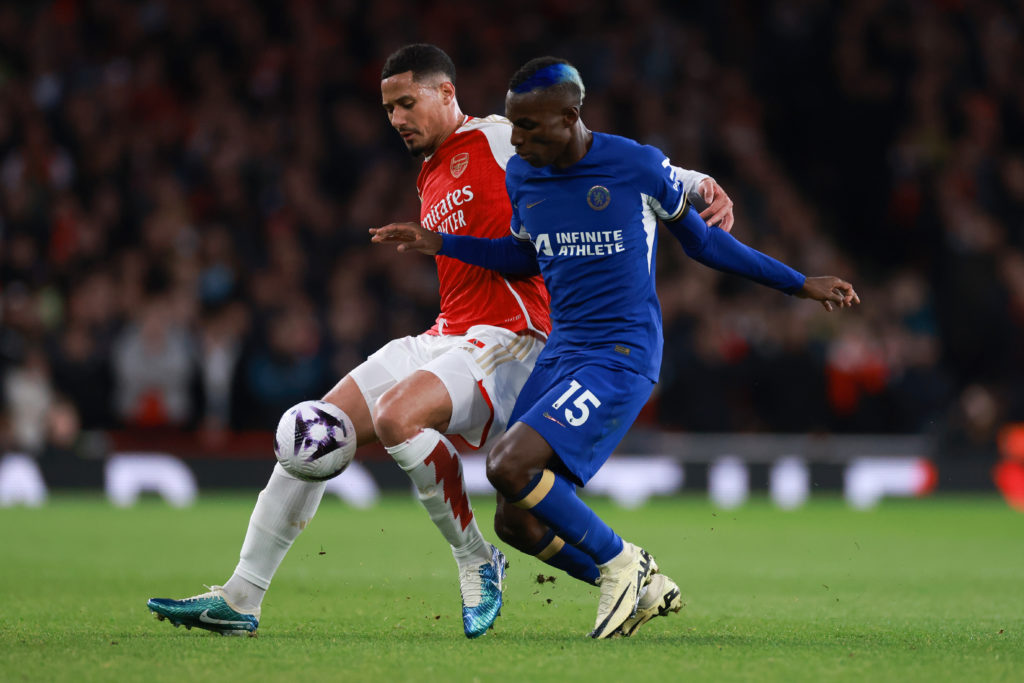 William Saliba of Arsenal tangles with Nicolas Jackson of Chelsea during the Premier League match between Arsenal FC and Chelsea FC at Emirates Sta...