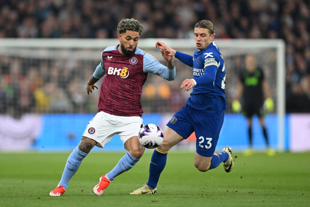 Douglas Luiz of Aston Villa and Conor Gallagher of Chelsea battle for possession during the Premier League match between Aston Villa and Chelsea FC...