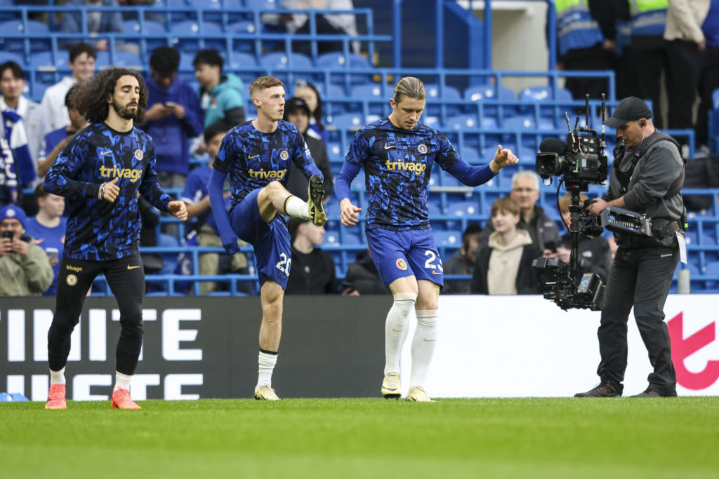 Marc Cucurella, Cole Palmer and Conor Gallagher of Chelsea warm-up before the Premier League match between Chelsea FC and Tottenham Hotspur at Stam...