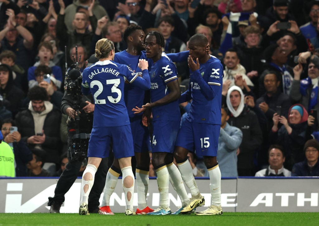 Trevoh Chalobah of Chelsea celebrates scoring his team's first goal with teammates during the Premier League match between Chelsea FC and Tottenham...