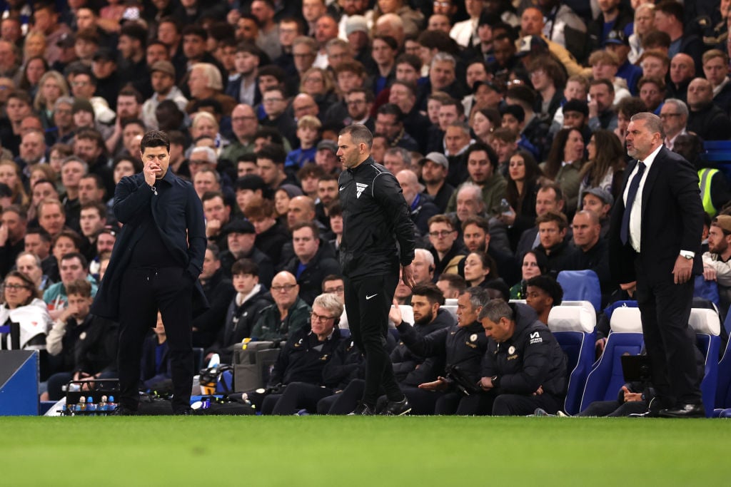 Mauricio Pochettino, Manager of Chelsea, looks on as Ange Postecoglou, Manager of Tottenham Hotspur, reacts during the Premier League match between...