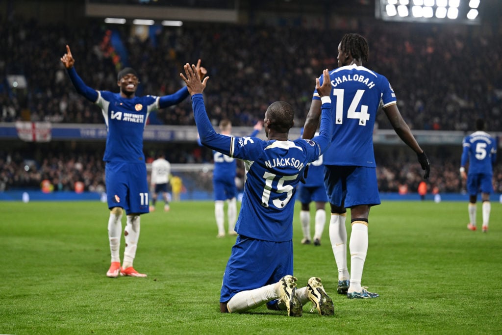 Nicolas Jackson of Chelsea celebrates scoring his team's second goal with teammates Noni Madueke and Trevoh Chalobah during the Premier League matc...
