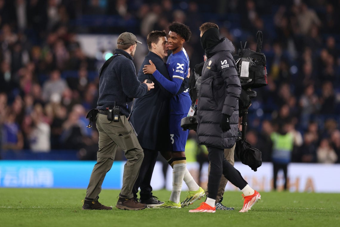 Mauricio Pochettino, Manager of Chelsea, embraces Josh-Kofi Acheampong of Chelsea after the Premier League match between Chelsea FC and Tottenham H...