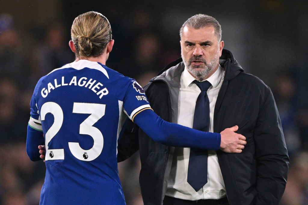 Conor Gallagher of Chelsea and Tottenham manager Ange Postecoglou share a moment after the Premier League match between Chelsea FC and Tottenham Ho...