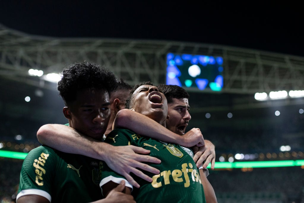 Estevao Oliveira (C) of Palmeiras celebrates after scoring the winning goal (2-1) with Romulo Azevedo of Palmeiras (R) and Endrick de Sousa of Palm...