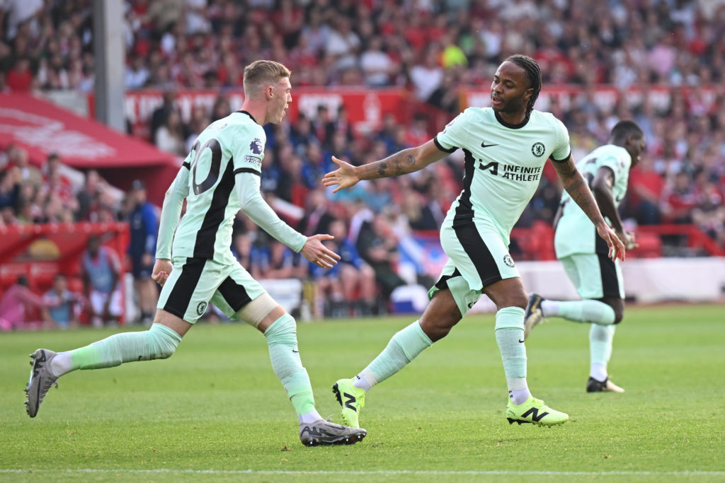 Raheem Sterling of Chelsea celebrates scoring his team's second goal with teammate Cole Palmer of Chelsea  during the Premier League match between ...