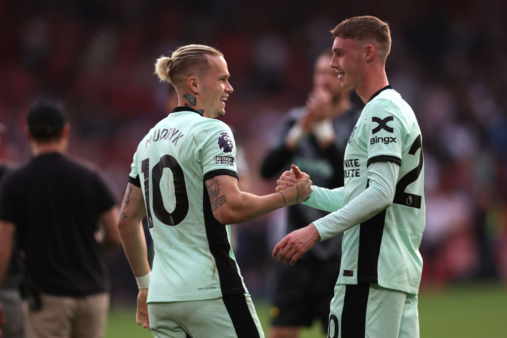 Mykhaylo Mudryk and Cole Palmer of Chelsea celebrate following the team's victory in the Premier League match between Nottingham Forest and Chelsea...