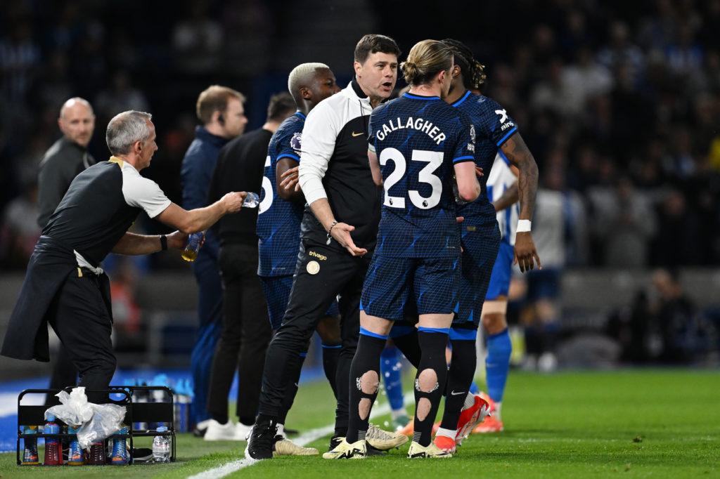 Mauricio Pochettino, Manager of Chelsea, gives instructions to Conor Gallagher of Chelsea during the Premier League match between Brighton & Ho...