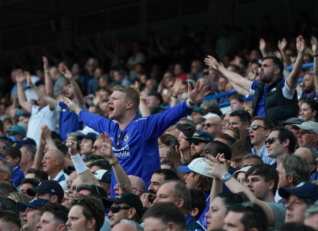 Chelsea fans watch their team in action during the Premier League match between Chelsea FC and AFC Bournemouth at Stamford Bridge on May 19, 2024 i...