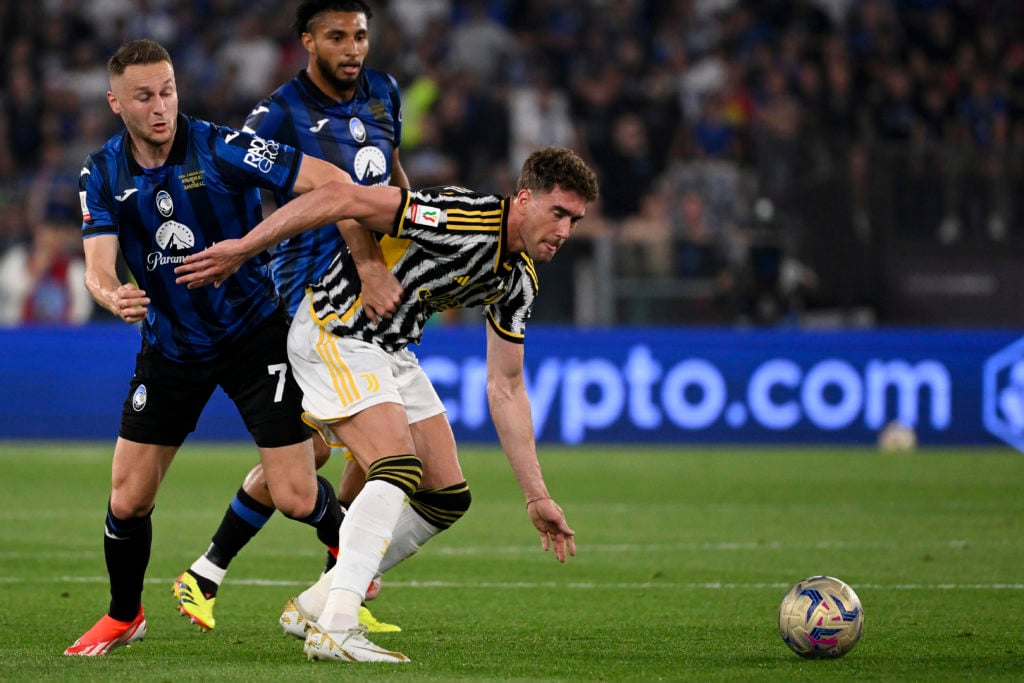 Teun Koopmeiners of Atalanta BC and Dusan Vlahovic of Juventus FC compete for the ball during the Italy cup final match between Atalanta BC and Juv...