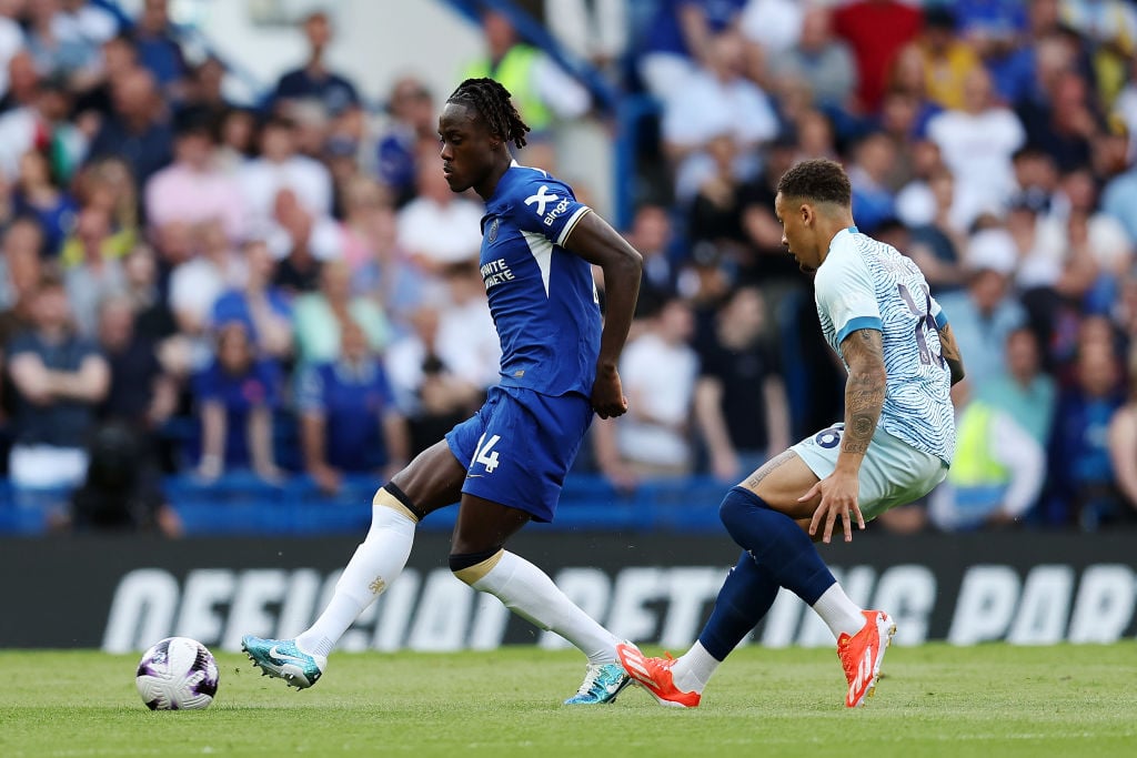 Trevoh Chalobah of Chelsea passes the ball whilst under pressure from Marcus Tavernier of AFC Bournemouth during the Premier League match between C...