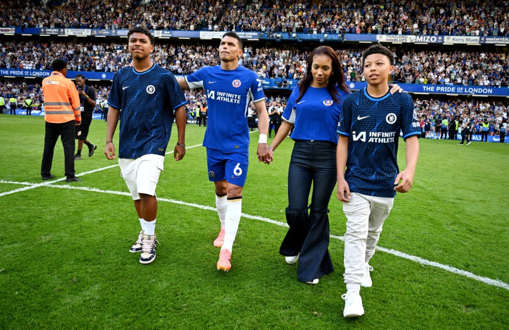 Thiago Silva of Chelsea shows appreciation to the fans with members of his family at full-time after his final appearance following the team's vict...