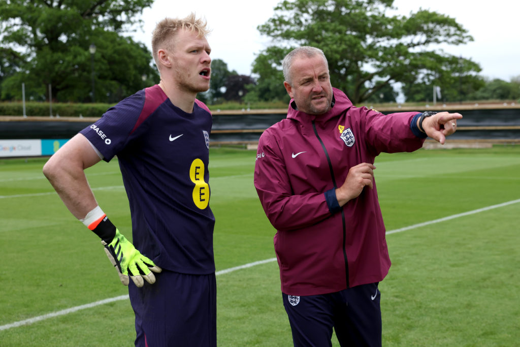 England goalkeeping coach, Martyn Margetson, talks to Aaron Ramsdale of England during a training session at Rockliffe Park on May 30, 2024 in Darl...