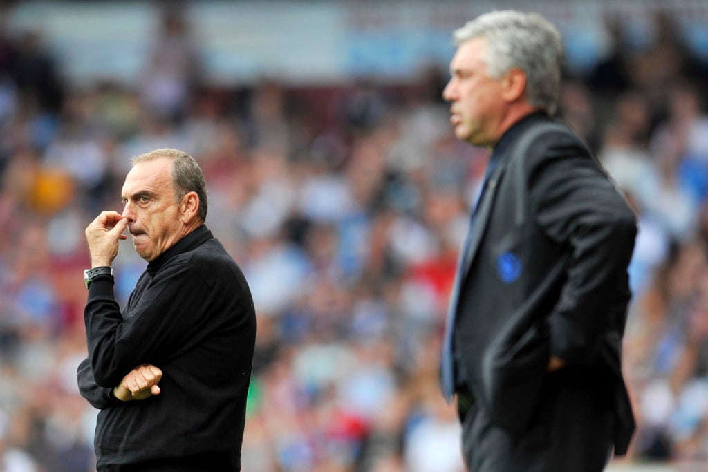 West Ham's Israeli manager Avram Grant (L) and Chelsea's Italian manager Carlo Ancelotti (R) during the English Premier League football match betwe...