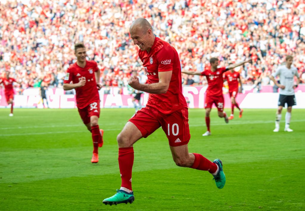 Bayern Munich's Dutch midfielder Arjen Robben celebrates after scoring during the German first division Bundesliga football match FC Bayern Munich ...