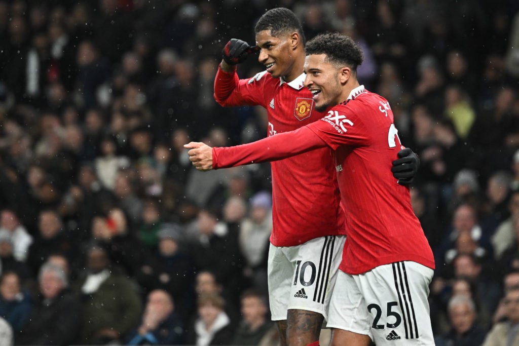 Marcus Rashford of Manchester United celebrates with teammate Jadon Sancho after scoring a goal during the Premier League match between Tottenham H...